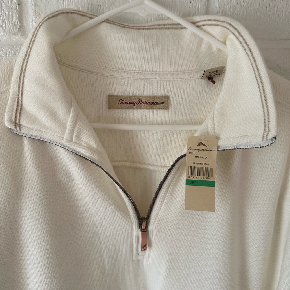 New with Tags, Tommy Bahama Cream Zip Sweater tag says L. This fits like XL